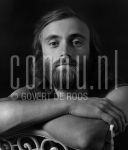 16-06-1976 Genesis studio Genesis Phil Collins at studio in Amsterdam, The Netherlands. June 16, 1976.  

[keywords]Posed, Headshot, Black & White Image[/keywords]